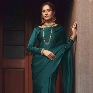 Plain Pakistani silk bottle green wedding saree for women with a rich and elegant finish